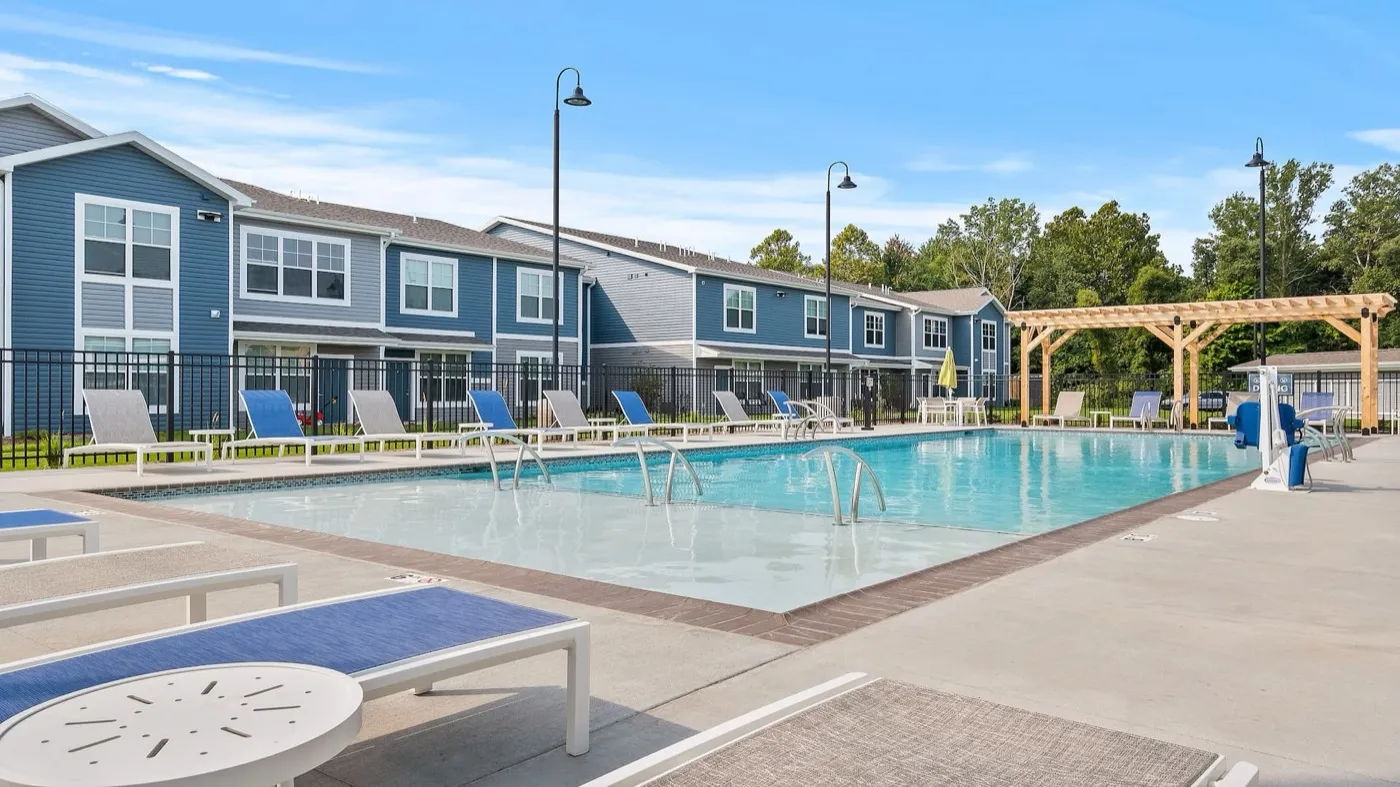 Authentix Bettendorf apartment exterior and pool deck